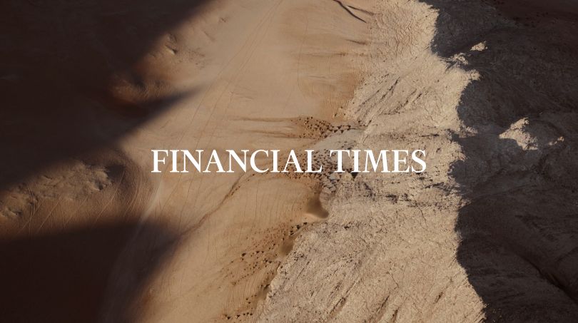 The words 'Financial times' written with a desert in the background.
